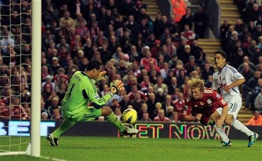Liverpool no pudo perforar la meta del Swansea. FOTO: AP