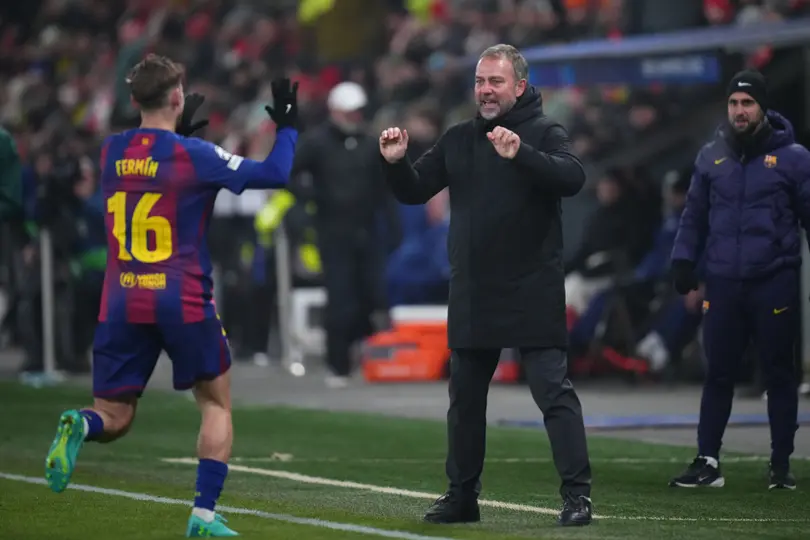 Hansi Flick en celebración con Fermín López en Champions League | AP