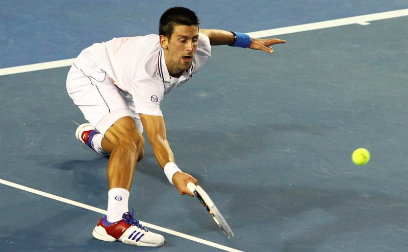 Ferrer propuso un juego intenso al serbio y exhibieron las capacidades físicas al extremo. FOTO: EFE
