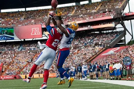 Darrelle Revis de los Jets y Greg Jennings de Empacadores | AP