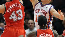 Knicks superan a Nets 99-92