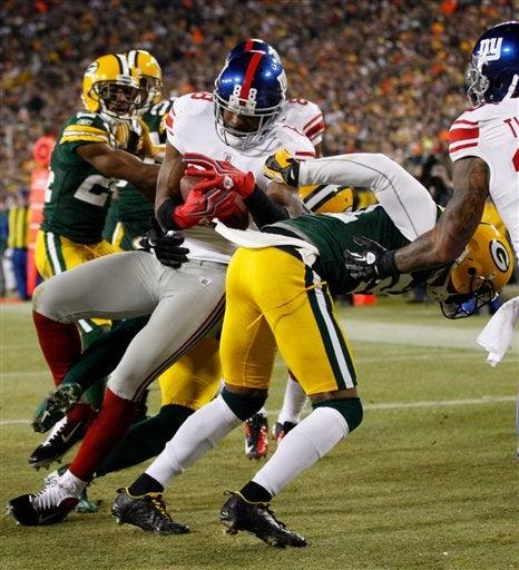 Hakeem Nicks atrapa el ovoide. FOTO: EFE