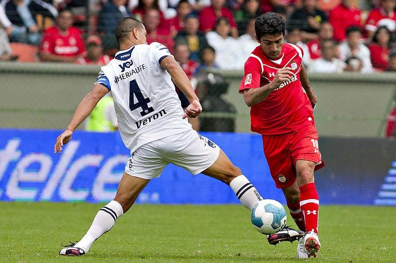 Tras ocho años de no ganar en el infierno, los pumas vencen 2-0 a los Diablos Rojos. FOTO: MEXSPORT