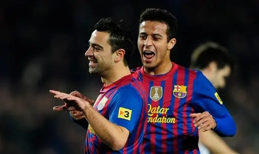 Xavi cree que Guardiola renovará con el Barcelona
