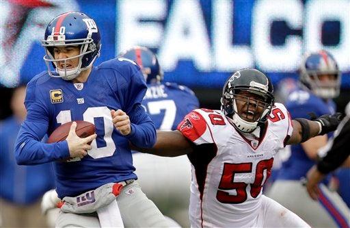 Eli Manning lanzó el domingo tres pases de touchdown. FOTO: AP