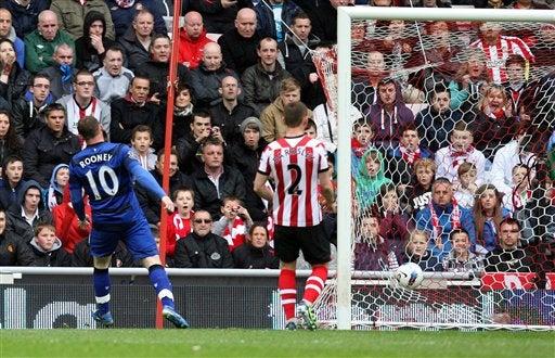 Rooney encontró el gol que los acercaba al título de la Premier League | AP