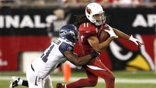 Fitzgerald ayuda a triunfo de Arizona ante Seattle