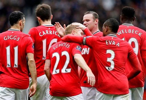 Los jugadores celebraron goles de Wayne Rooney y Paul Scholes. FOTO: AP