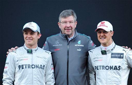 Schumacher, Rosberg y Ross Brawn presentan el vehículo.  (FOTO: AP)
