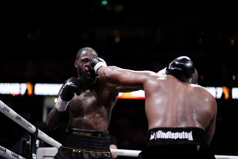 Deontay Wilder y Dereck Chisora | AP