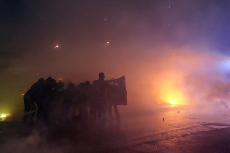 La protesta también apuntó a la presencia de agentes del ICE acompañando a la delegación de Estados Unidos, en medio de la polémica por redadas migratorias en Minneapolis / AP