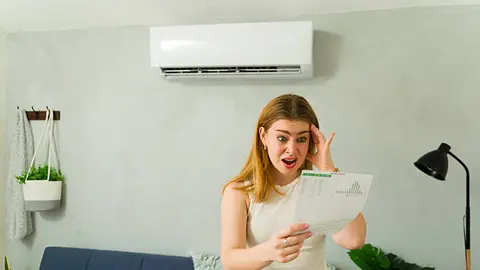 Mantener el aire acondicionado entre 24 y 26 grados puede ayudar a reducir el consumo de energía y pagar menos en el recibo de la CFE. / iStock
