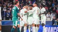 Jugadores de Francia celebran con Michael Olise en el partido contra la Selección de Irlanda del Norte | AFP