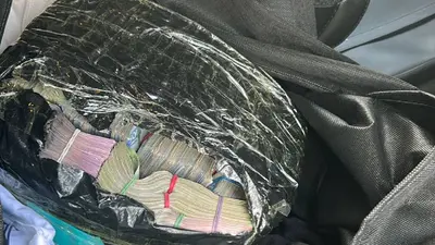Detienen a dos jóvenes en Guanajuato con 1.6 mdp en efectivo