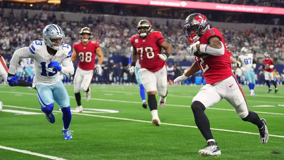 Emeka Egbuka anotando ante los Dallas Cowboys | AP