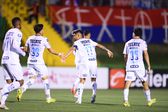 Jugadores de Rayados celebran con 'Tecatito' tras el empate ante Xelajú en el juego de ida de la Primera Ronda de la Copa de Campeones Concacaf | MEXSPORT