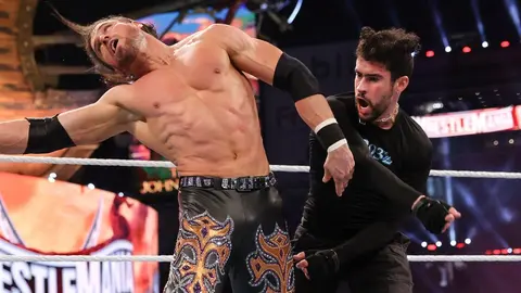 Bad Bunny golpeando a John Morrison | wwe.com