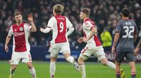 Jugadores de Ajax en festejo durante el partido contra Olympiacos en Champions League | AP