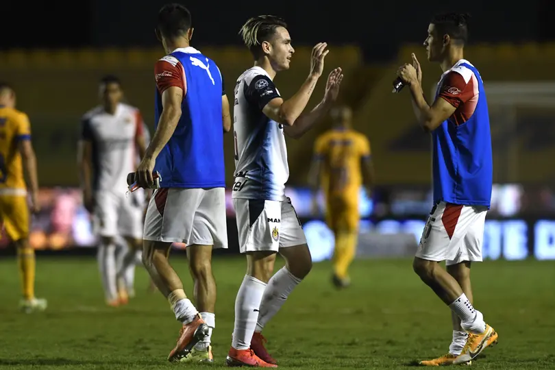 Jesús Ángulo y Uriel Antuna tras vencer a Tigres en el Guard1anes 2020 | IMAGO7