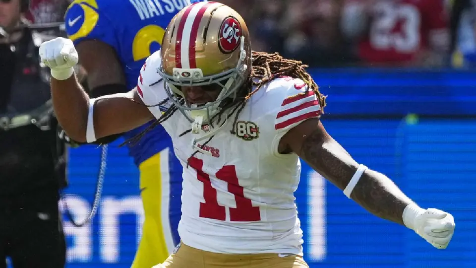 Demarcus Robinson celebrando anotación ante los Rams | AP