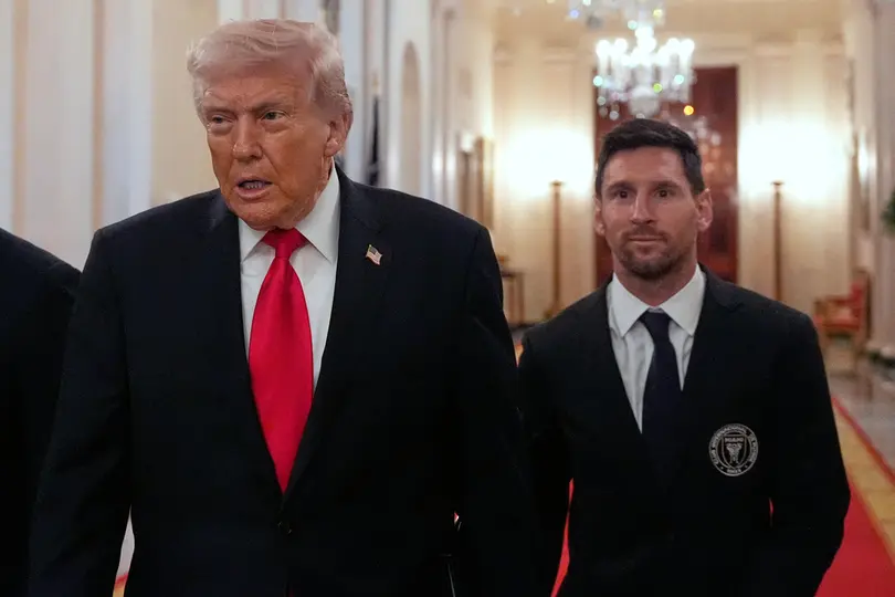 Donald Trump junto a Lionel Messi | AP