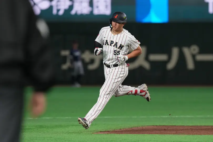Murakami haciendo una carrera con el equipo de Japón I AP