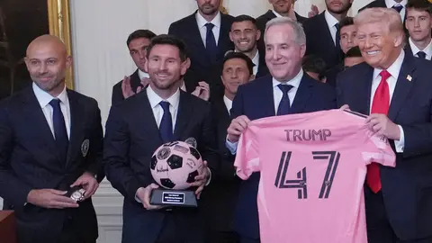 Donald Trump junto a Lionel Messi | AP