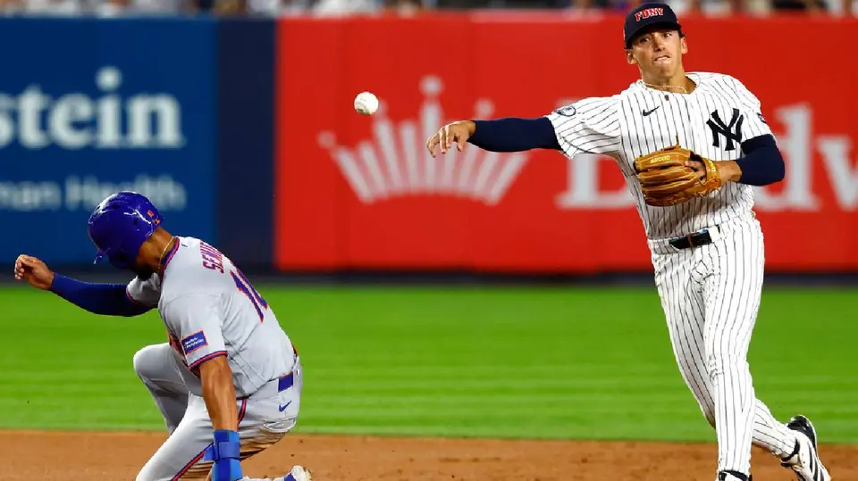 Marcus Semien y George Lombard Jr. | AP