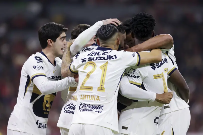 Jugadores de Pumas en celebración de gol en el partido contra Atlas en la Jornada 5 del Clausura 2026 | IMAGO 7