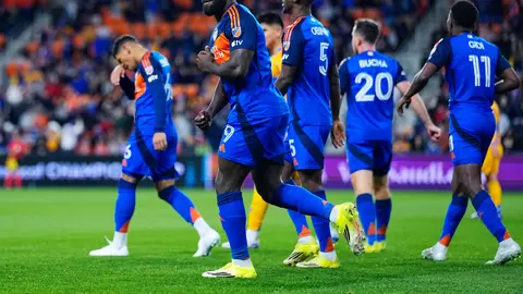 Jugadores de Cincinnati festejan la ventaja ante Tigres | MEXSPORT