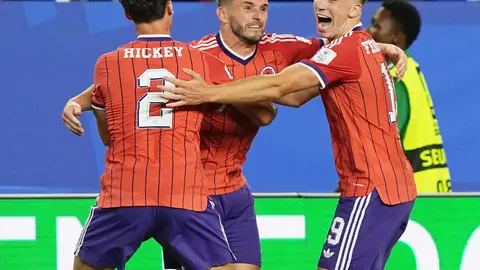 Jugadores de Escocia celebrando el histórico gol | AP