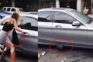 Lady Racista: Policía rescata su bolso tras ser agredida por manifestantes