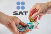 SAT devolución 2025: ¿por qué se retrasa y qué compensación te toca?