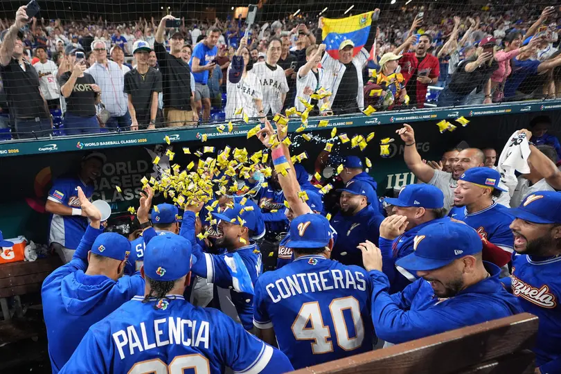 Venezuela celebrando su victoria ante Japón en el Clásico Mundial I AP