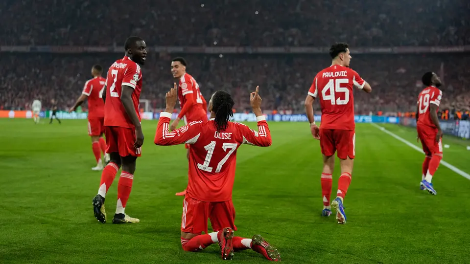 Michael Olis celebrando su gol ante el Real Madrid en Champions League I AP
