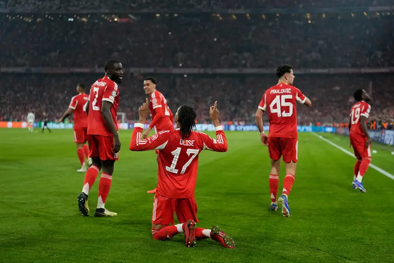Michael Olis celebrando su gol ante el Real Madrid en Champions League I AP