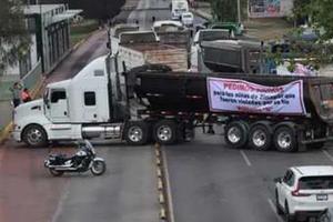 Transportistas piden se investigue a Sindicato de Cemento tras bloqueos