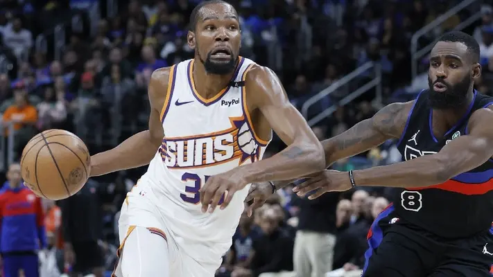 Durant y Booker conducen victoria de los Suns125-121 sobre Pistons
