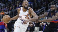 Durant y Booker conducen victoria de los Suns125-121 sobre Pistons