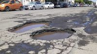 Si tu auto sufrió daños por un bache en el Edomex, puedes solicitar una indemnización