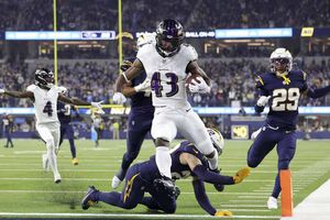 Ravens derrotó a los Chargers y John Harbaugh vence una vez más a su hermano
