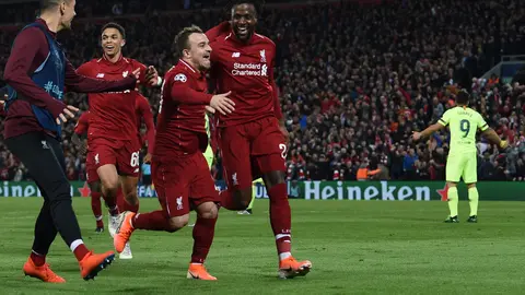 Divock Origi y Xherdan Shaqiri, del Liverpool, en 2019 | AFP