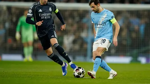Fede Valverde y Bernardo Silva | AP