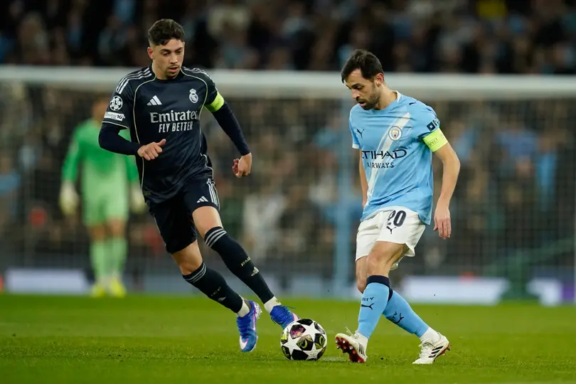 Fede Valverde y Bernardo Silva | AP