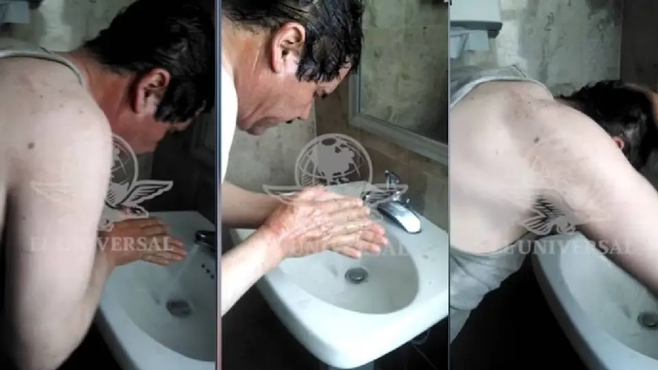 no de los videos inéditos muestra a “El Chapo” Guzmán lavándose el rostro en la habitación 51 del Hotel & Suites Doux después de su detención./ Captura de pantalla El Universal
