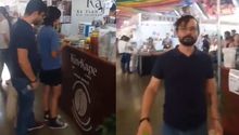 Sorprenden a hombre grabando debajo de la falda de mujeres en Feria de Puebla 2024
