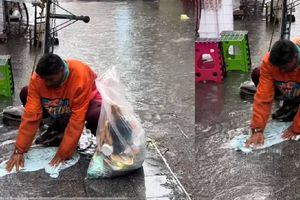 ¡Increíble! Captan a un hombre lavando su ropa con agua de lluvia en la CDMX