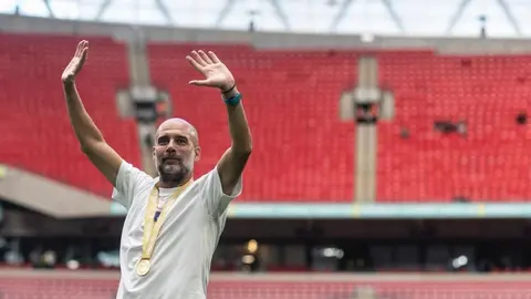 ¿Cuántos títulos como entrenador tiene Pep Guardiola?
