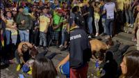 Aficionado cae desde un semáforo en festejos de la 15 en el Ángel de la Independencia