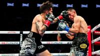 ‘Bam’ Rodríguez propina su primer KO a ‘Gallo’ Estrada y es nuevo campeón supermosca del CMB